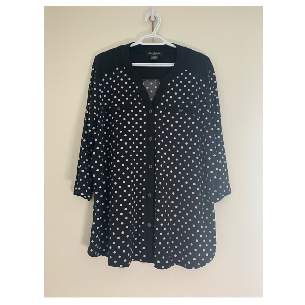 Plus size woman’s polka dot blouse